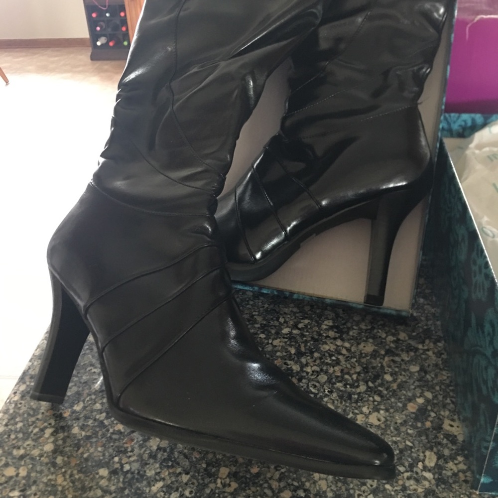 Tall black boots